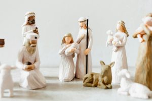 a group of figurines of people and animals